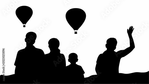 Silhouette of a family watching hot air balloons in the sky during sunrise or sunset with a bright sky background creating a peaceful and joyful atmosphere