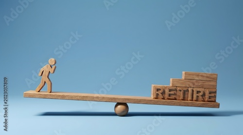 Wooden Seesaw with Retirement Word Blocks Tipped on Wood Table