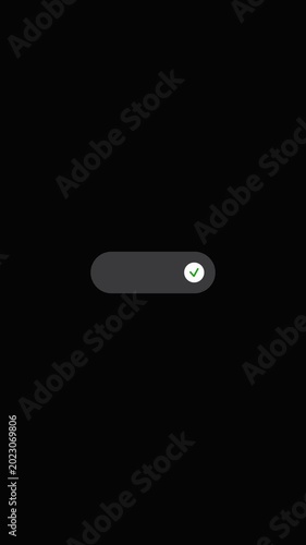Close-up of a modern toggle switch icon on a black digital interface with cursor pointer