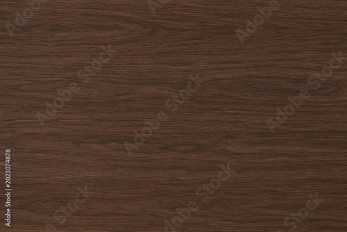 Fotografie Dark walnut wood texture with deep brown tones, rich flowing grain, and smooth elegant surface
