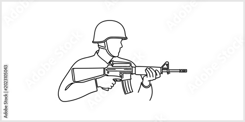 Photos Soldier in Helmet Holding Rifle