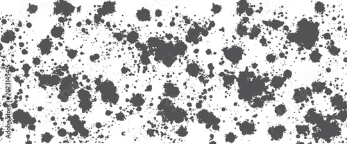 Dark gray splatter pattern on white background