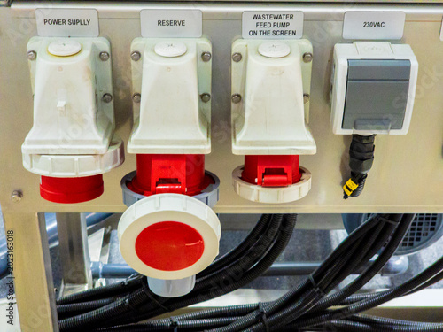 Schilderij op canvas Industrial Electrical Power Panel with Labeled High-Voltage CEE Sockets and Wast