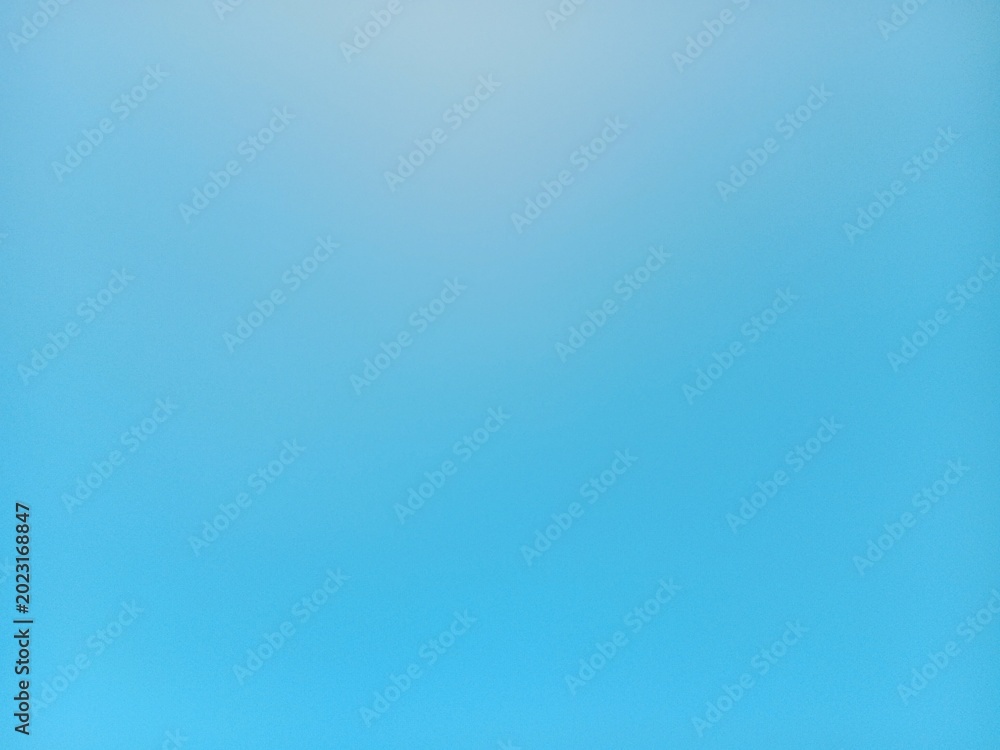 Naklejka premium Soft abstract blue gradient background with smooth texture and minimal modern design. Perfect for wallpaper, banner, presentation, social media, and digital backdrop.