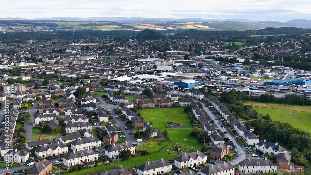 Obraz premium Aerial Drone View of Dundee Suburban Neighborhood and Distant Hills