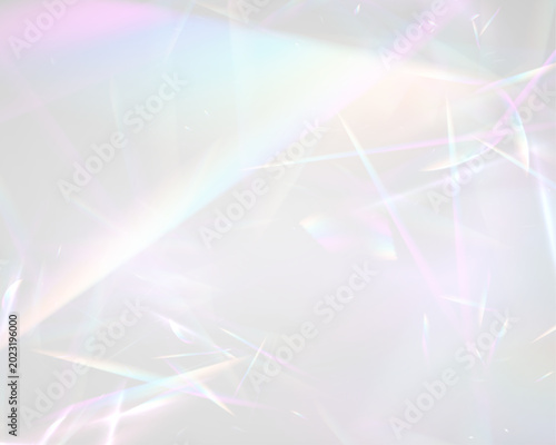 фотографія Diamond rainbow prism glows with crystal neon light over glass glitter in sun rays