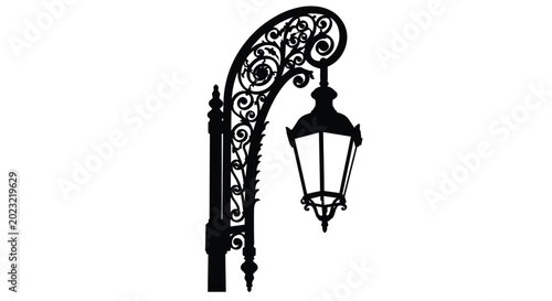 Fotografie Ornate wrought iron street lamp post silhouette