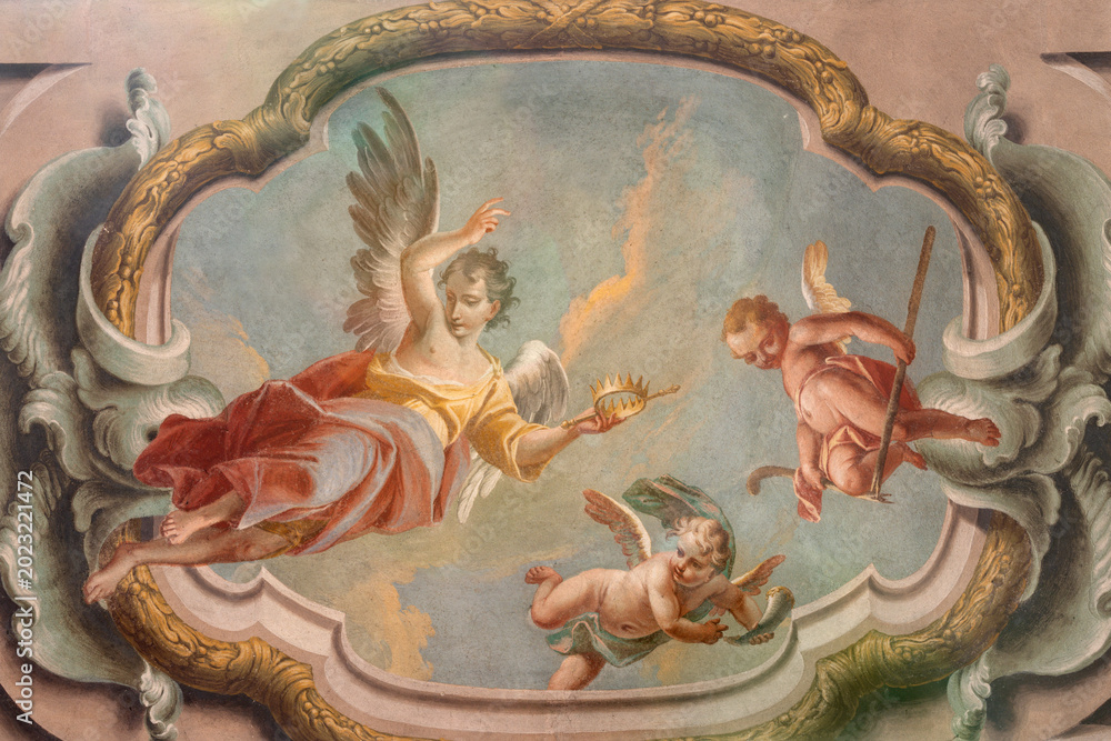 Fototapeta premium CREMA, ITALY - MARCH 20, 2026: The fresco of baroque angels with the symbols of David the church Santuario di Santa Maria della Croce by brothers Giuseppe and Giovanni Antonio Torricell from year 1762