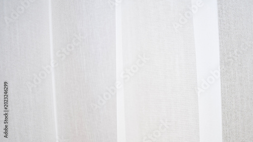 Canvas Print Close-up of white transparent tulle curtains with soft sunlight
