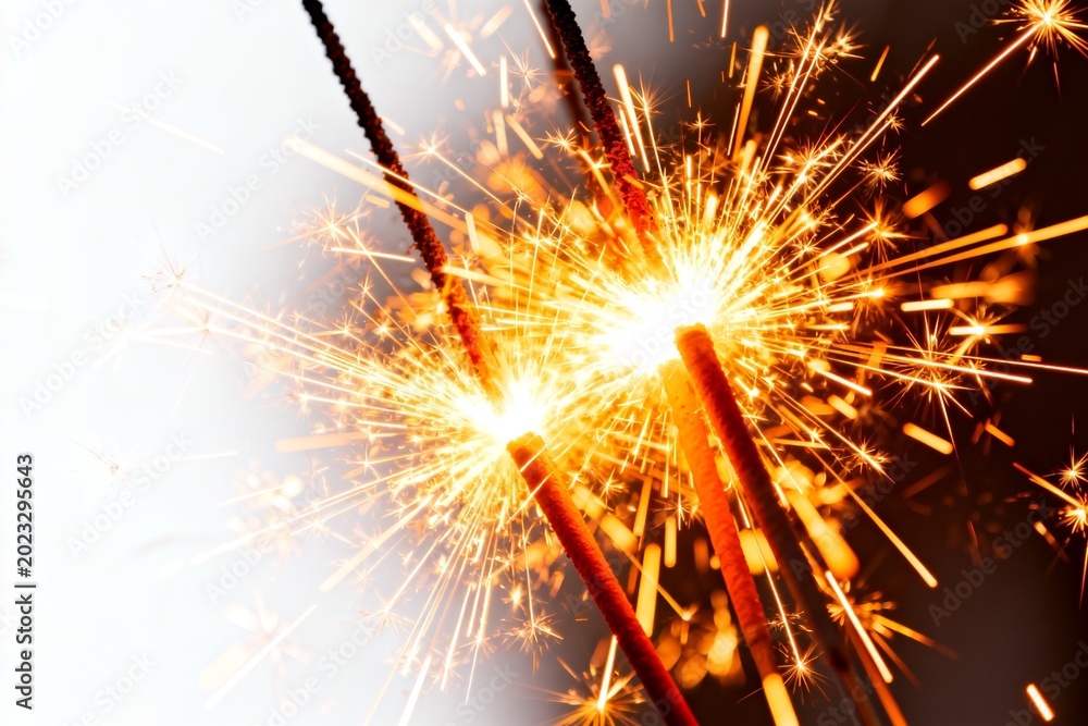 Fototapeta premium Sparks from lit firecrackers