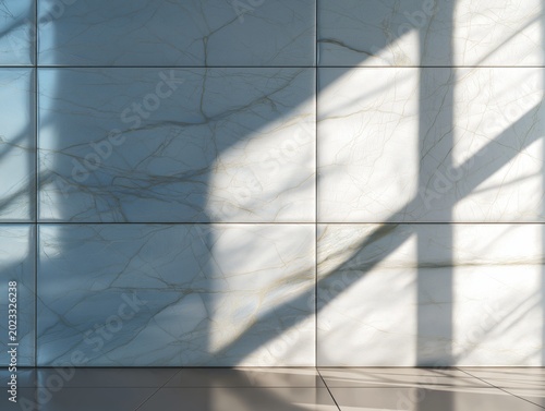Polished marble wall panels featuring light reflections and soft shadows creating a modern architectural interior design