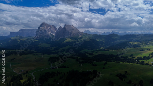 Принти на полотні Majestic mountain peaks stand tall against a dramatic sky in the Dolomites durin