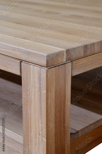 Close up of oak wood coffee table corner