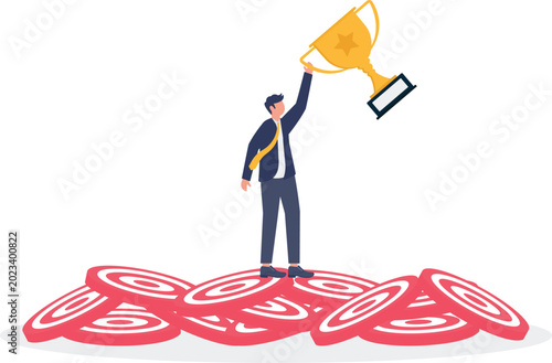 Slika na platnu Professional holding trophy aloft standing on a pile of target boards