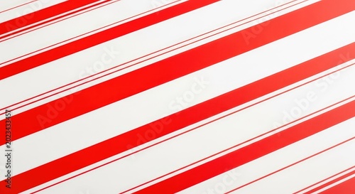 Vibrant red and white stripes create a dynamic pattern, enhanced by delicate thin red lines running parallel across the modern surface, creative, textile, vibrant