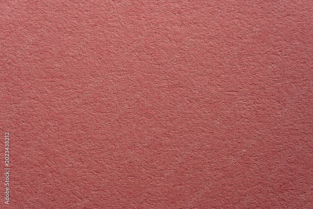 Fototapeta premium Macro shot pink craft paper or recycled cardboard texture. High quality abstract background for stationery scrapbooking and eco friendly branding design