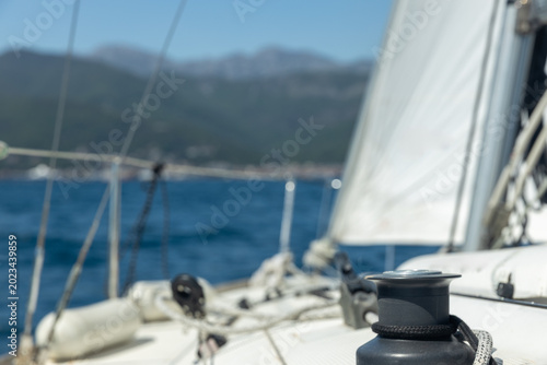 view of the seashore from a sailboat