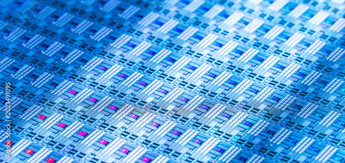 Bild auf Leinwand Macro background of silicon wafer semiconductor with neon color, integrated circ