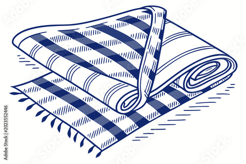Rolled up striped blanket with fringe on bottom edge