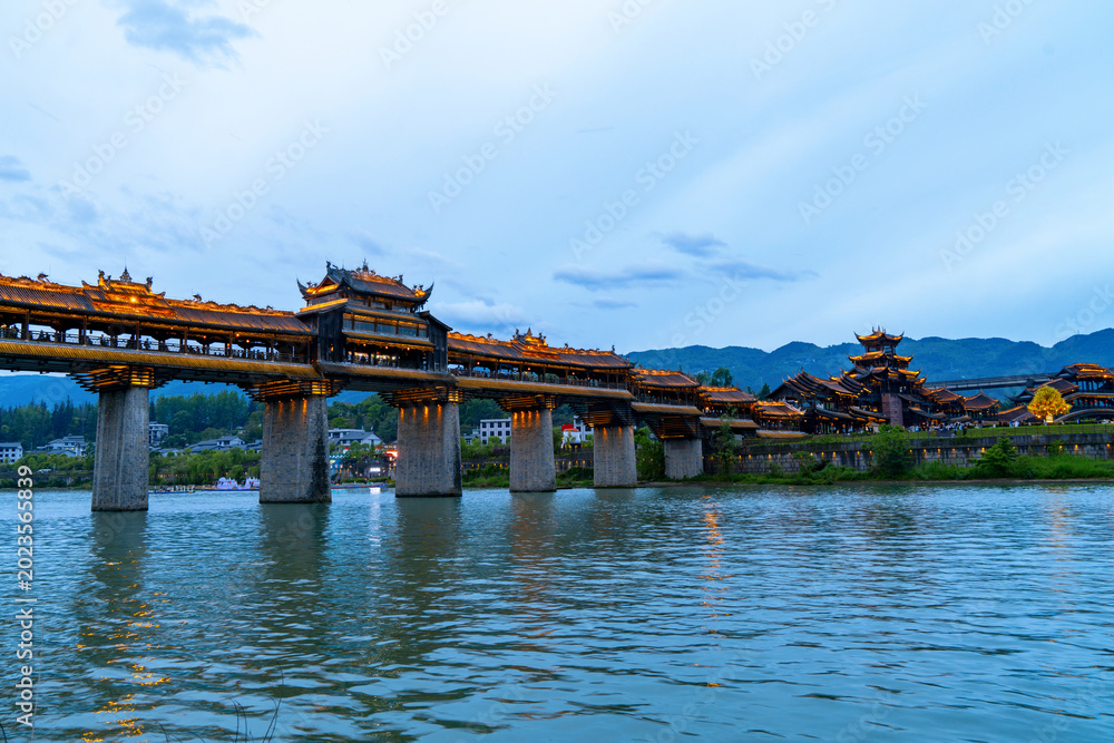 Naklejka premium The ancient covered bridge over the river is known as the No.1 covered bridge in Asia.