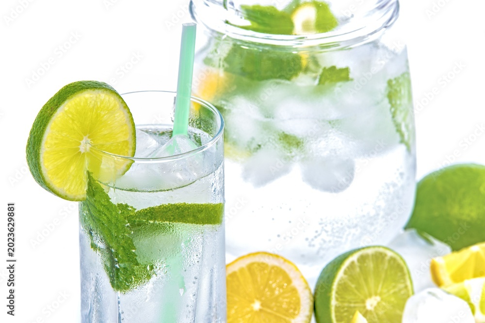 Fototapeta premium Refreshing mojito drink with lime mint and ice cubes