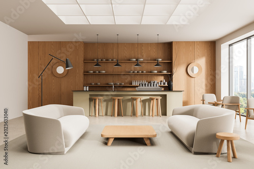 Slika na platnu Modern minimalist cafe interior with soft seating, wooden accents, open shelves, pendant lighting, and serene daylight atmosphere in elegant architecture design