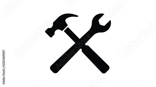Fotografie hammer and wrench silhouette crossed tools on white background