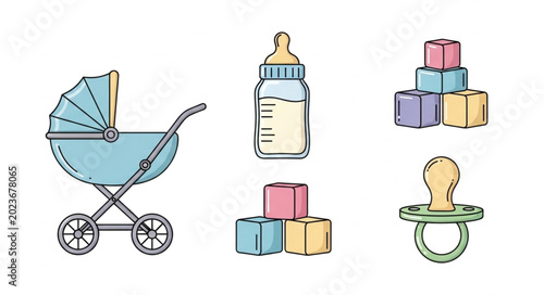 Fotografie Baby essentials including a stroller bottle blocks and pacifier.