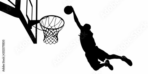Fotografía basketball player silhouette dunking ball into hoop on white background