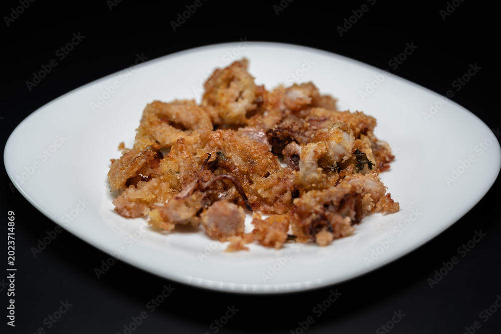 Naklejka premium Tasty and light baked squid au gratin