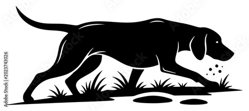 Tableau sur toile Hunting dog tracking scent on ground in nature black silhouette style