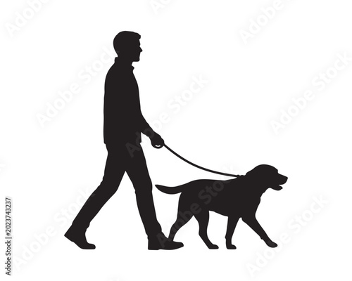 Silhouette of a man walking with his dog on leash isolated on gray background, pet owner outdoor activity concept with Labrador retriever, companionship and daily exercise