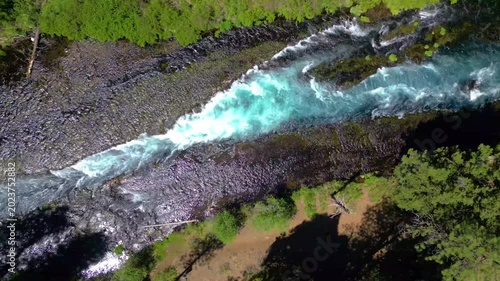 Crystal clear blue waters of the Metolius River from a drone over the Wizard Falls area in central Oregon