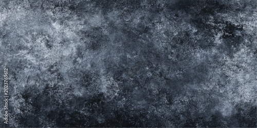 Foto A dark blue and black textured background with a dramatic explosion of smoke and