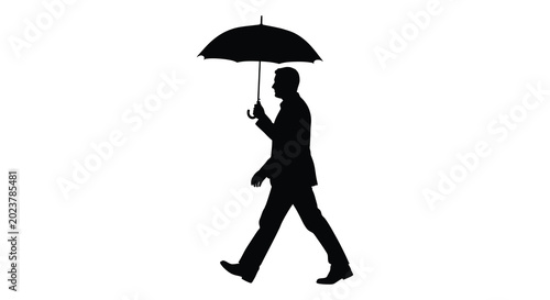 man with umbrella walking in silhouette