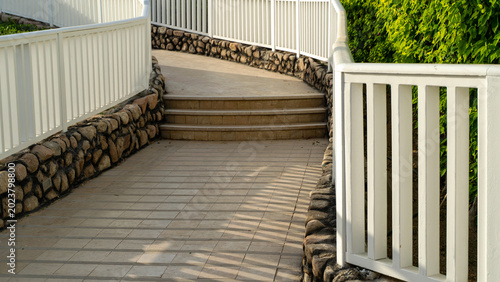 Photos White railings flank stone-lined steps