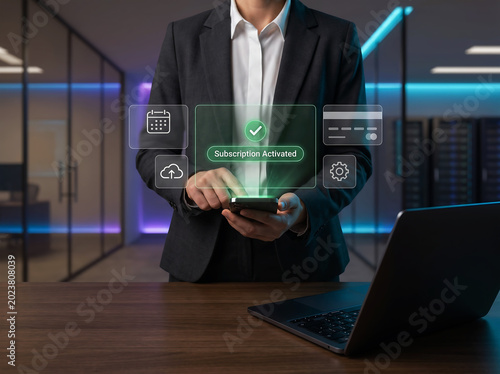 Person activating a subscription on smartphone with a green 'subscription activated' message and surrounding icons for calendar, cloud, credit card, and settings in office setting.