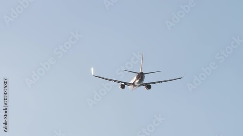 Jet aircraft taking off from runway at Phuket International Airport in Thailand.