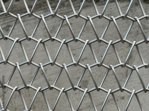 Shiny Steel Wire Mesh Pattern Industrial Abstract Background