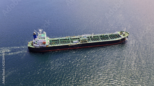 Quadro em tela Aerial drone photo of crude Oil tanker ship underway towards open sea, a merchan