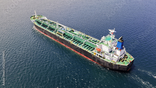 Slika na platnu Aerial drone photo of crude Oil tanker ship underway towards open sea, a merchan