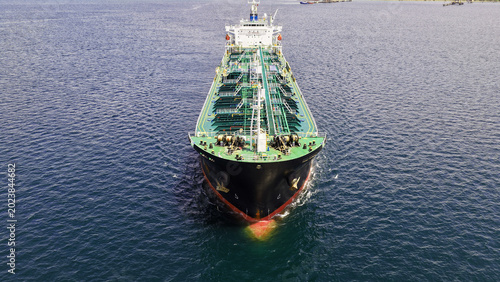 Tableau sur toile Aerial drone photo of crude Oil tanker ship underway towards open sea, a merchan