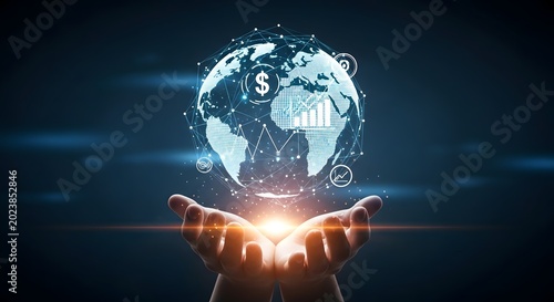 A glowing blue and white globe with financial symbols on a person's hand