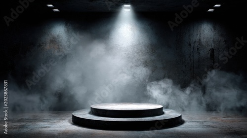 Empty stage with spotlight and fog behind slightly raised platform for performance or presentation backdrop