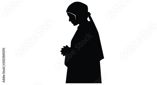 Fotografija silhouette of a person praying with hands clasped high quality professional