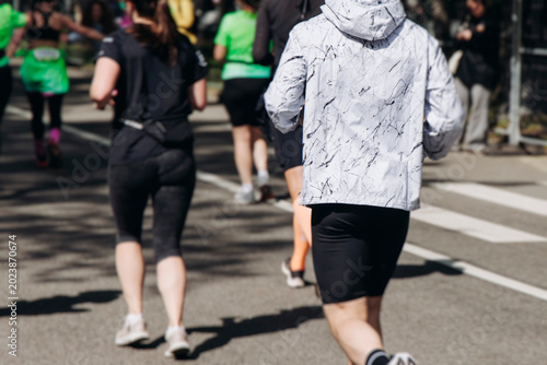 Canvas Print Marathon runners crowd, sportsmen participants start running the half-marathon i