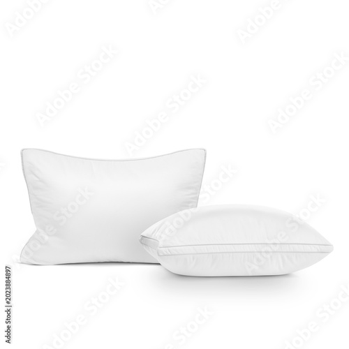Foto Set of two white soft bed pillows isolated on white background.