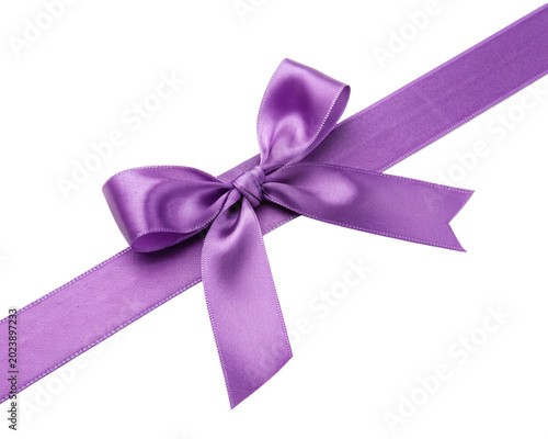 Purple bow on white background
