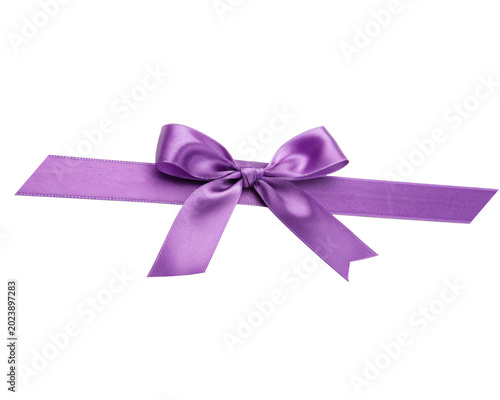 Purple bow on white background