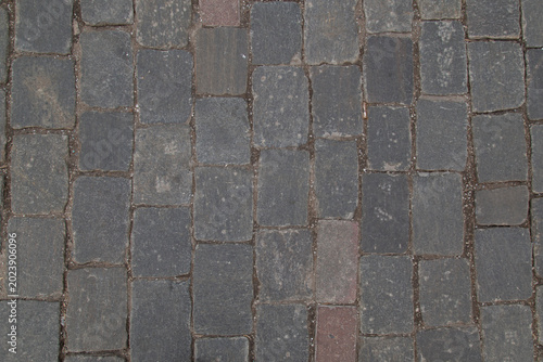 Photography Stone paving stones on a street in Moscow. Background.